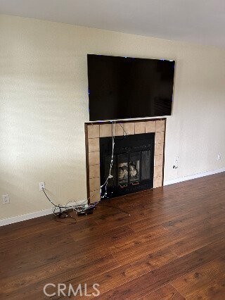 1743 Northview Place Paso Robles, CA 93446 - Photo 3 of 26 a room with wooden floor and a fireplace