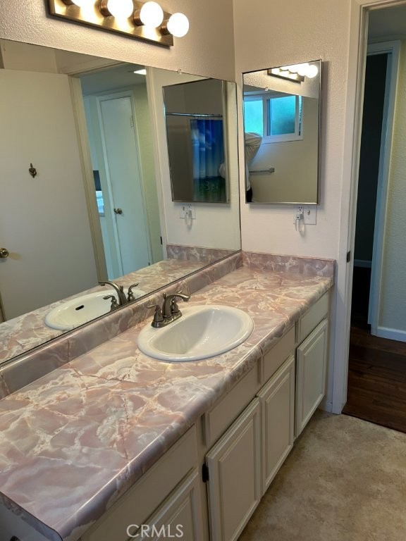 1743 Northview Place Paso Robles, CA 93446 - Photo 10 of 26 a bathroom with a sink and a mirror