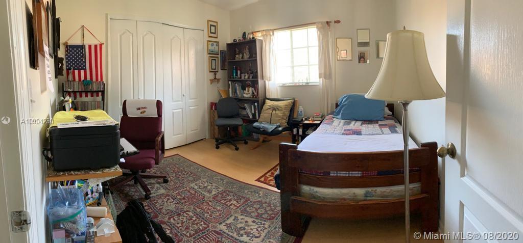 6857 Southwest 158th Pass Miami, FL 33193 - Photo 22 of 41 a view of a workspace with furniture and a window