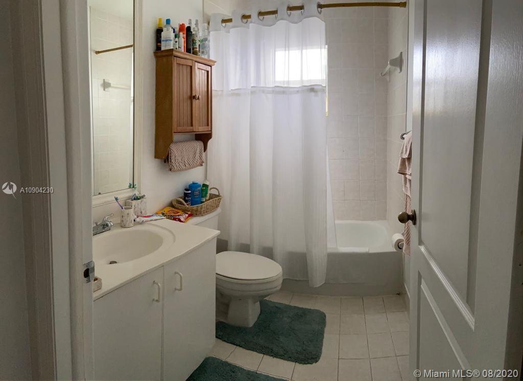 6857 Southwest 158th Pass Miami, FL 33193 - Photo 23 of 41 a bathroom with a sink toilet and shower