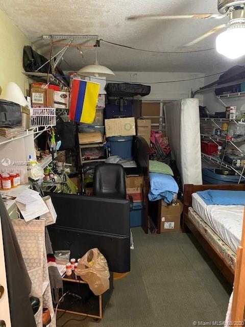 6857 Southwest 158th Pass Miami, FL 33193 - Photo 35 of 41 a bedroom with furniture and a couch