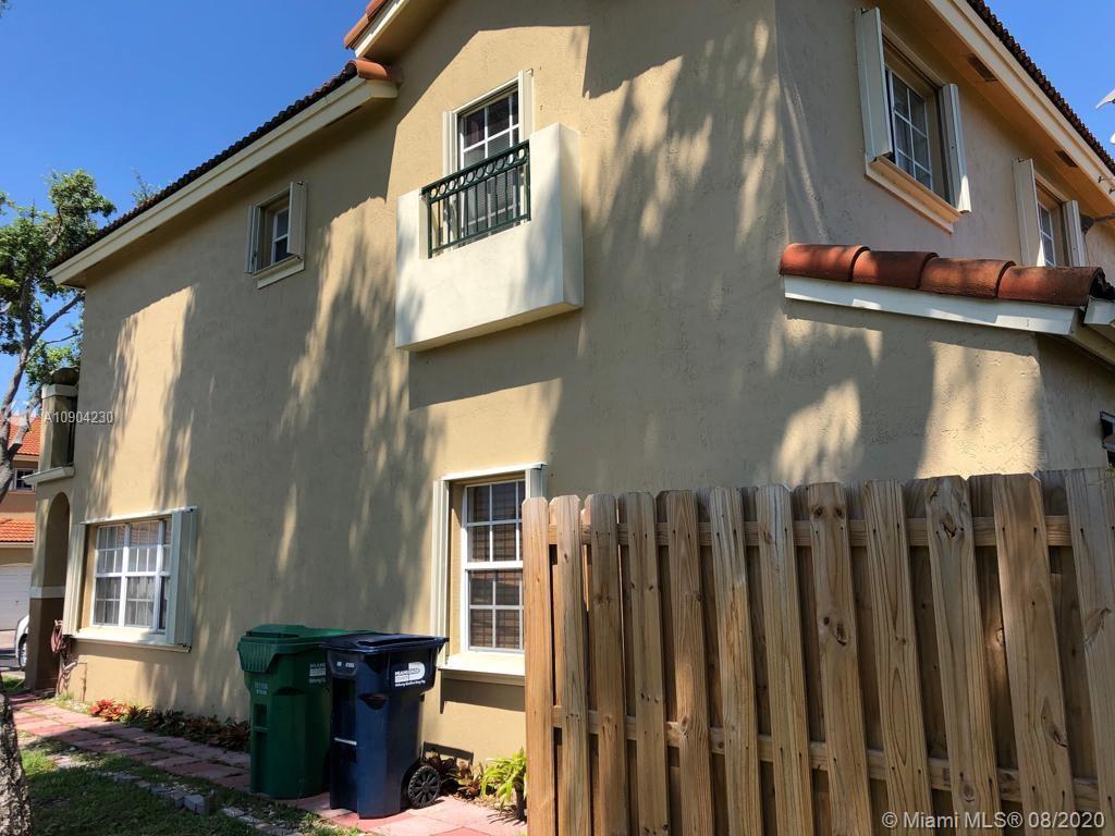 6857 Southwest 158th Pass Miami, FL 33193 - Photo 4 of 41 a front view of a house with street