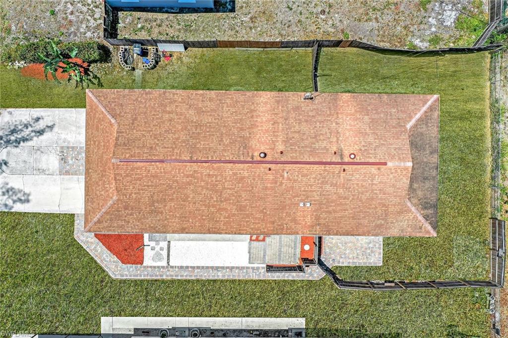 4402 Pine Lake Road Bonita Springs, FL 34134 - Photo 15 of 16 an aerial view of a house with a yard