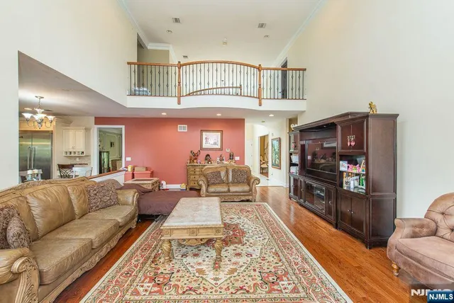 a living room with furniture and a rug