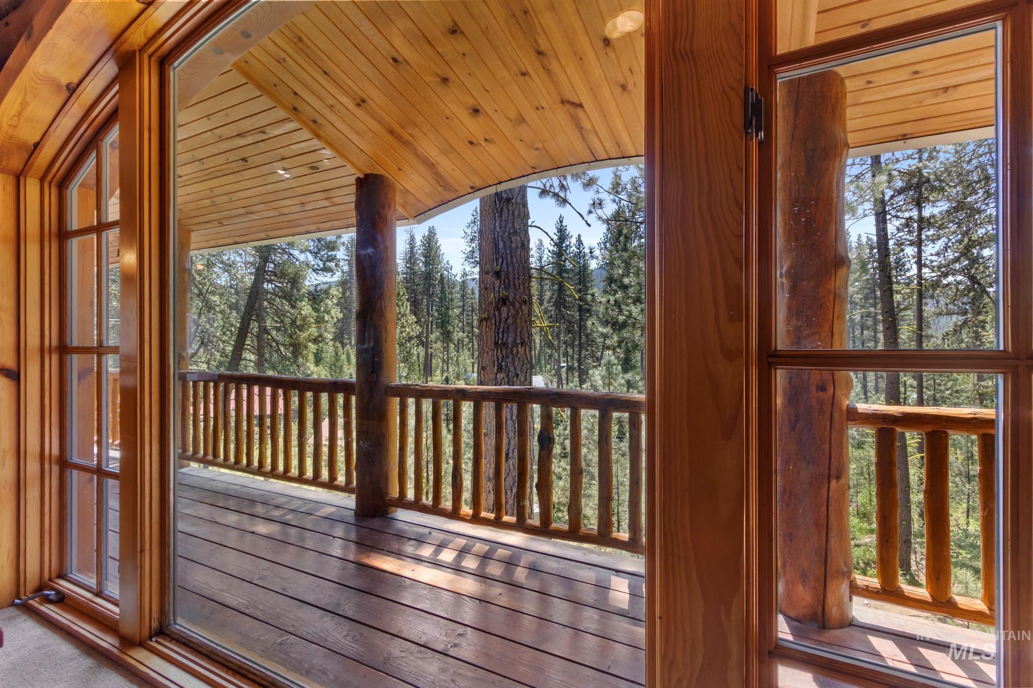 85 Pine Top Road Boise, ID 83716 - Photo 10 of 33 Expansive wood deck with natural wood railing and support beams