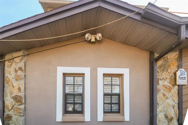 a front view of a house with windows