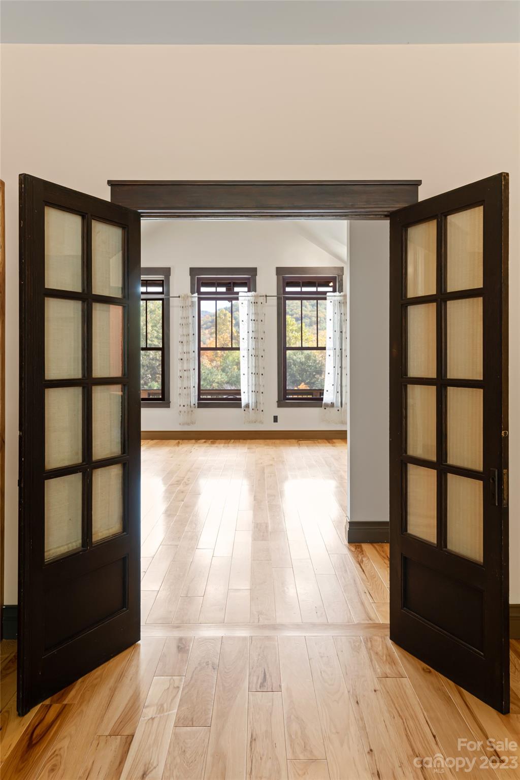 1025 Morgan Hill Road Black Mountain, NC 28711 - Photo 11 of 48 a view of an empty room with a window