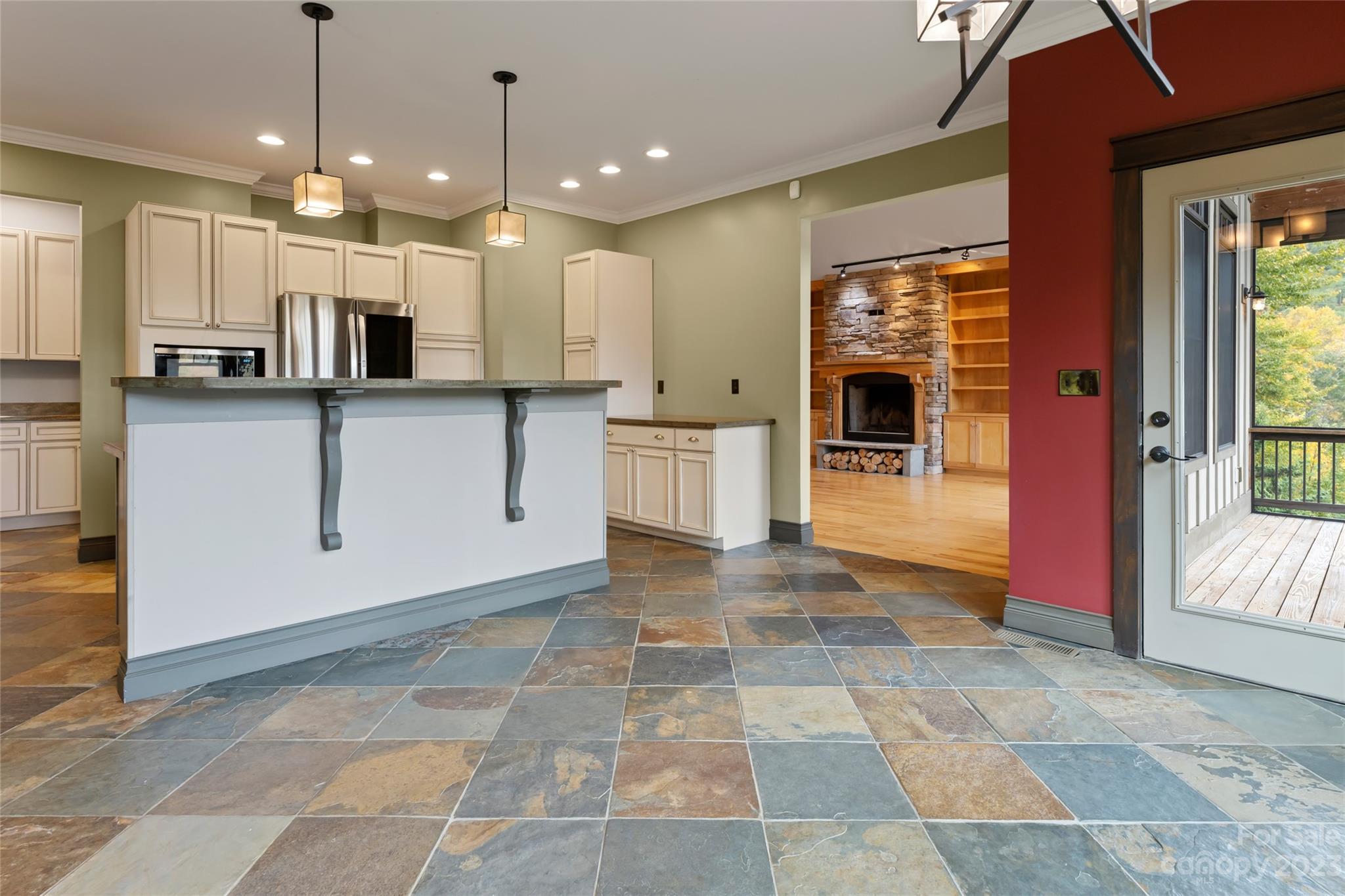 1025 Morgan Hill Road Black Mountain, NC 28711 - Photo 13 of 48 a kitchen with stainless steel appliances granite countertop a refrigerator and a sink
