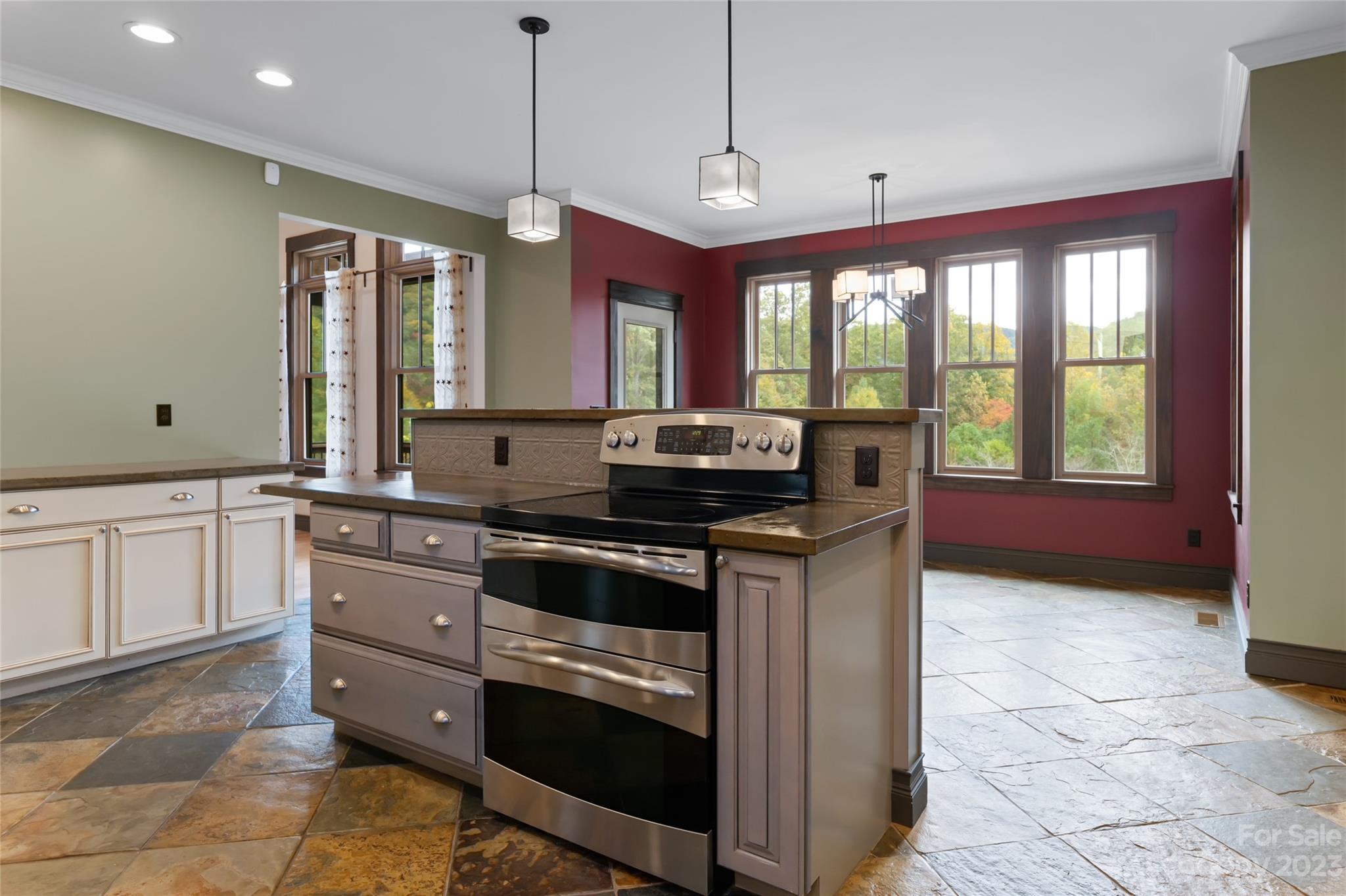 1025 Morgan Hill Road Black Mountain, NC 28711 - Photo 17 of 48 a kitchen with stainless steel appliances granite countertop a stove a sink and a refrigerator