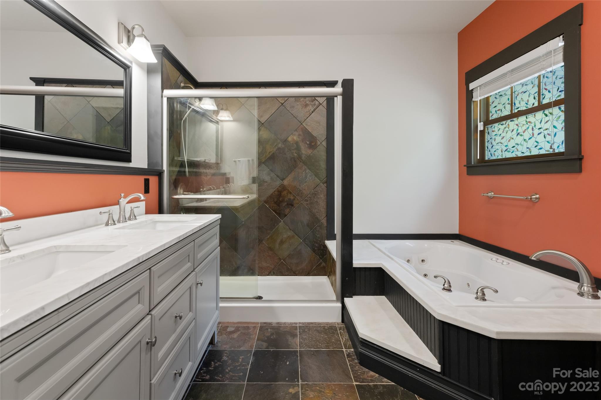 1025 Morgan Hill Road Black Mountain, NC 28711 - Photo 24 of 48 a bathroom with a bathtub and a sink