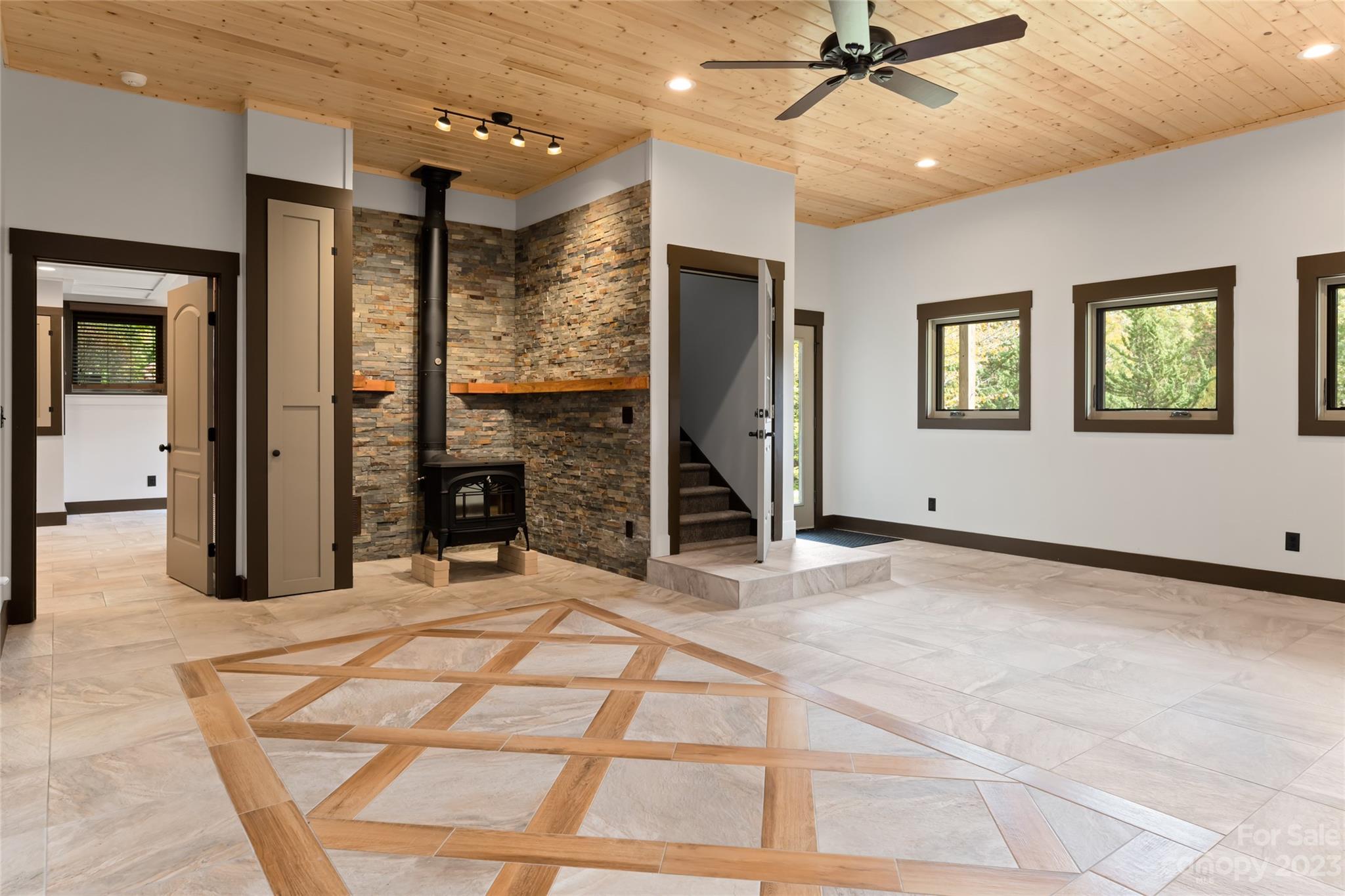 1025 Morgan Hill Road Black Mountain, NC 28711 - Photo 27 of 48 a view of an empty room with a fireplace