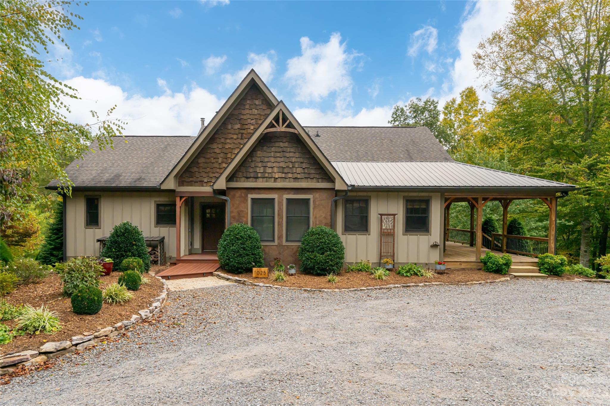 1025 Morgan Hill Road Black Mountain, NC 28711 - Photo 3 of 48 a front view of a house with garden