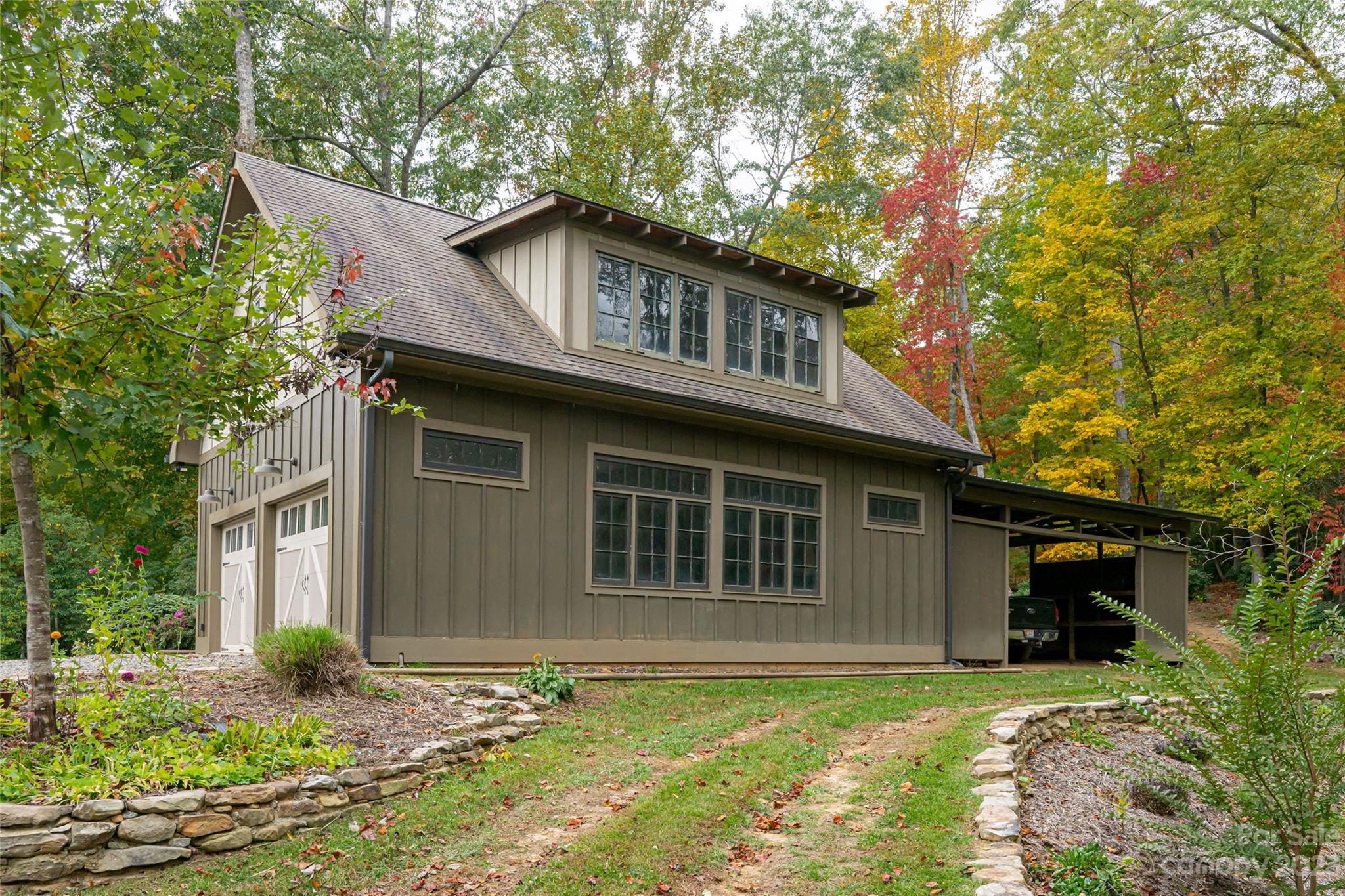 1025 Morgan Hill Road Black Mountain, NC 28711 - Photo 36 of 48 a view of a house with a yard