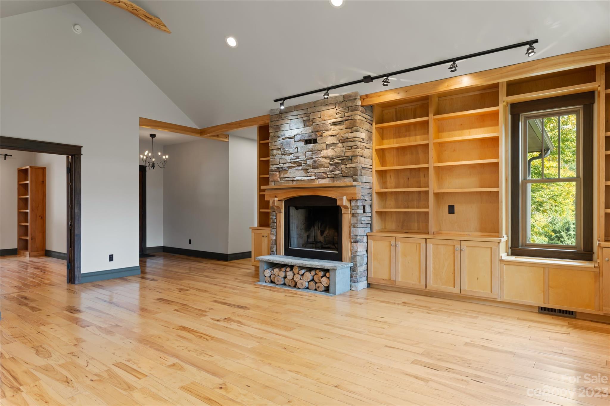 1025 Morgan Hill Road Black Mountain, NC 28711 - Photo 10 of 48 a view of an empty room with a fireplace and a window