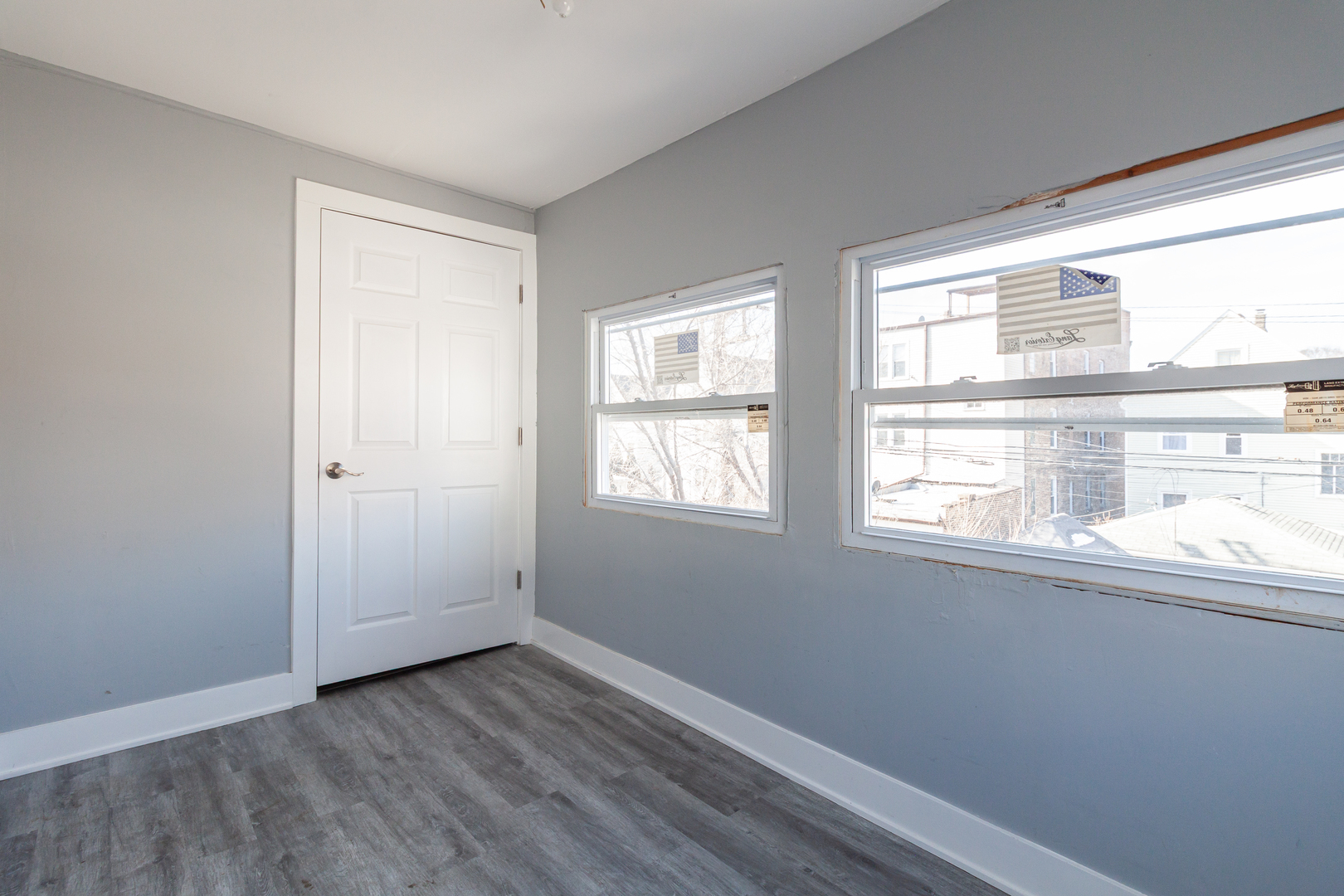 2968 North Ridgeway Avenue, Unit 2R Chicago, IL 60618 - Photo 23 of 23 a view of empty room with wooden floor and fan