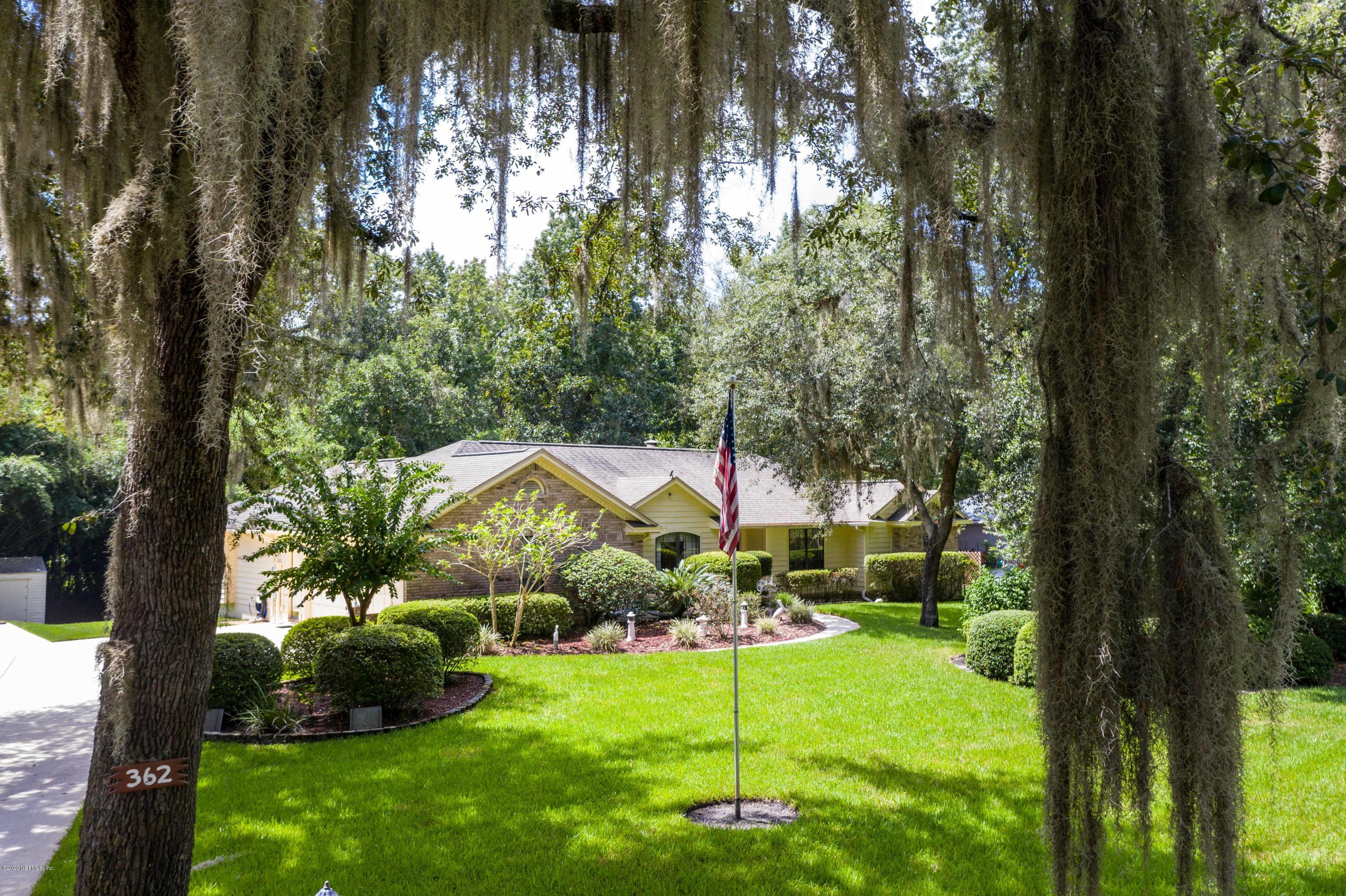 362 North Ridge Drive Fleming Island, FL 32003 - Photo 44 of 49 Front with trees