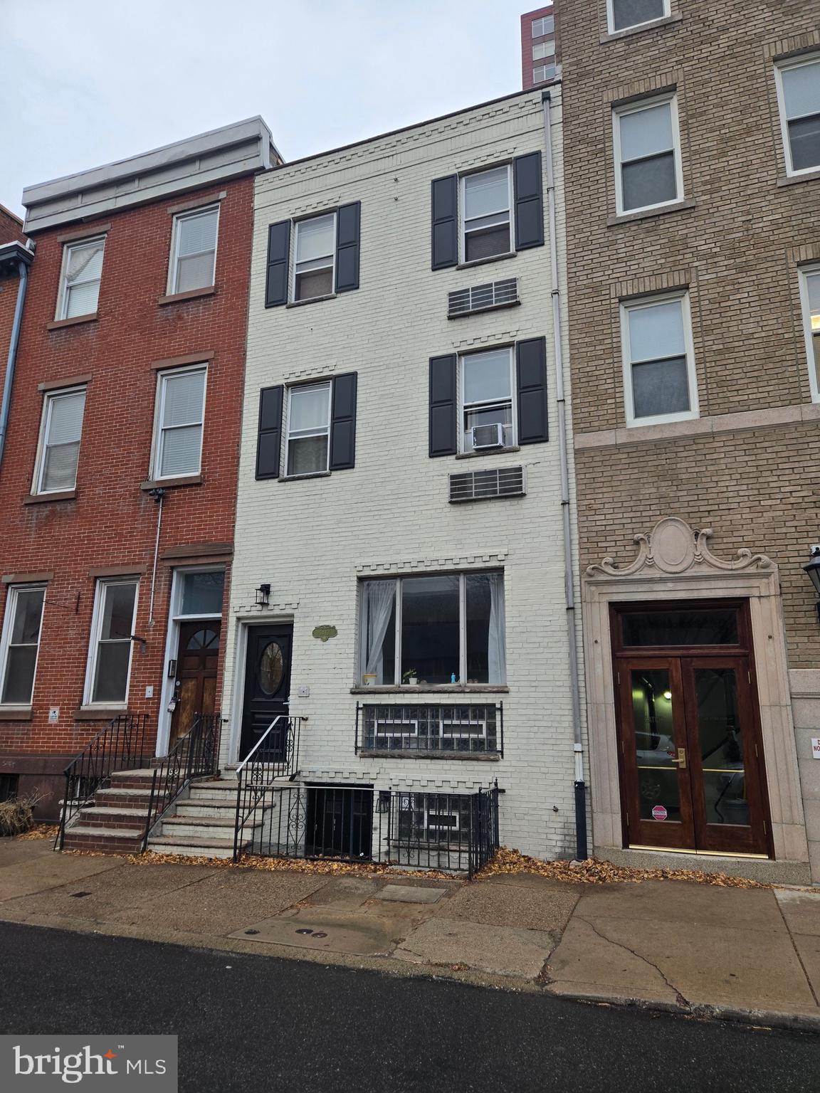 1413 Lombard Street, Unit 2R Philadelphia, PA 19146 - Photo 1 of 15 a view of a building with a street
