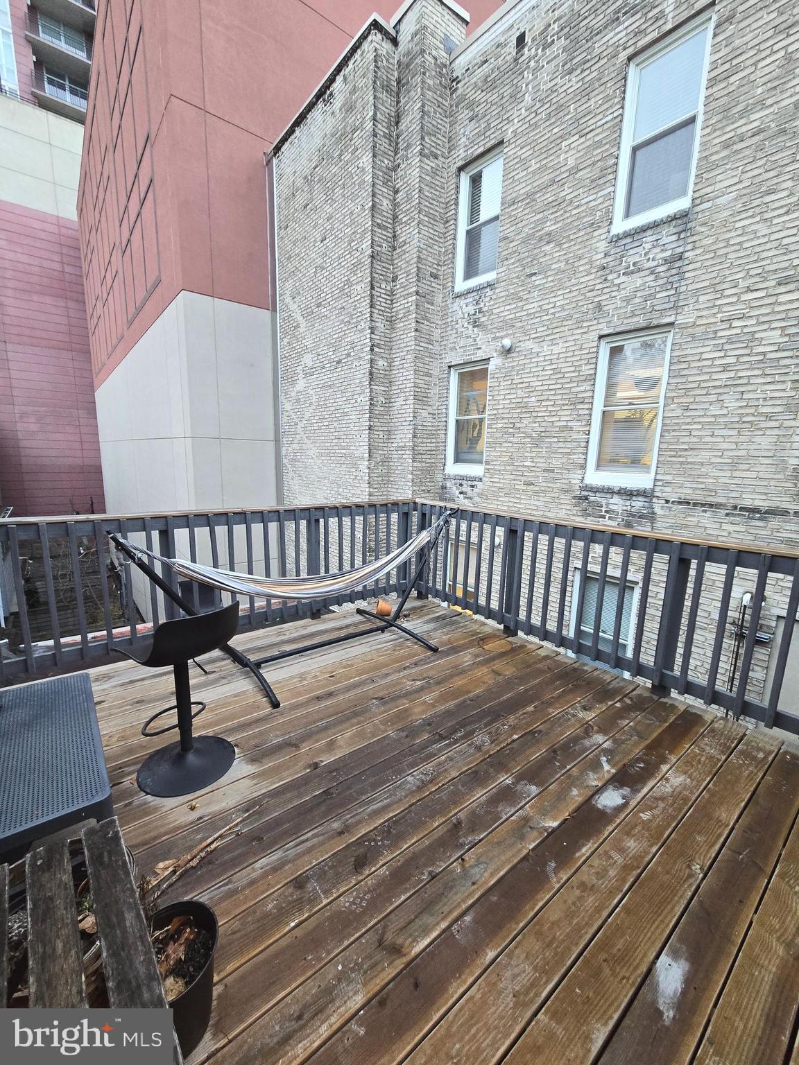 1413 Lombard Street, Unit 2R Philadelphia, PA 19146 - Photo 13 of 14 a view of a chairs setting on the roof deck