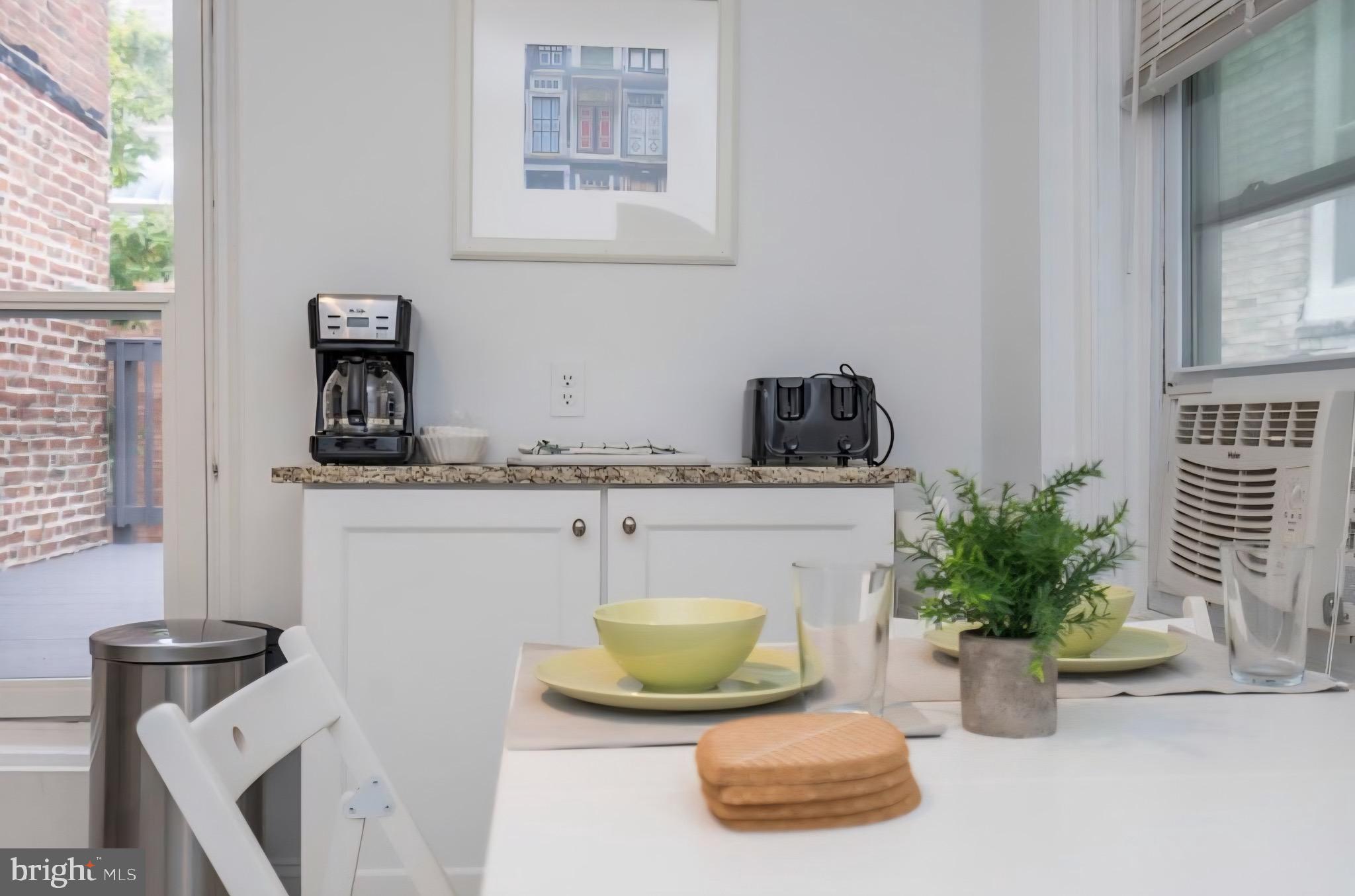 1413 Lombard Street, Unit 2R Philadelphia, PA 19146 - Photo 6 of 15 a bathroom with a potted plant and a window