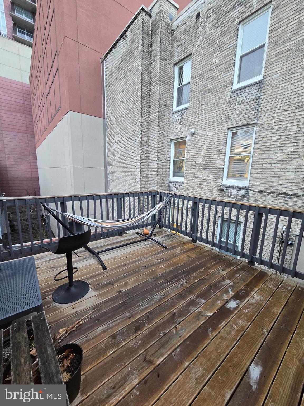 1413 Lombard Street, Unit 2R Philadelphia, PA 19146 - Photo 8 of 15 a view of a chairs setting on the roof deck