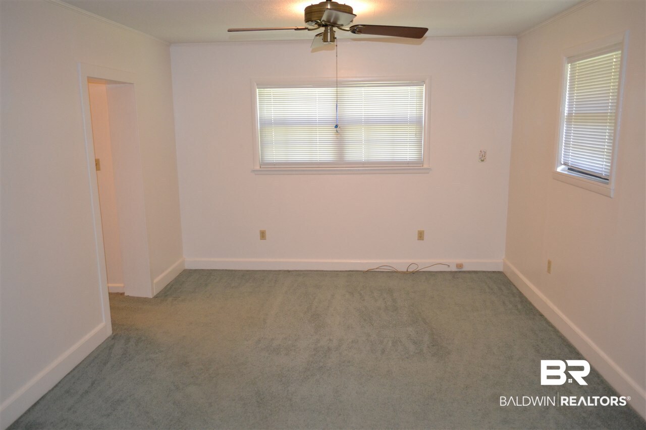 1525 North Alston Street Foley, AL 36535 - Photo 9 of 26 This bedroom has its own private bath.