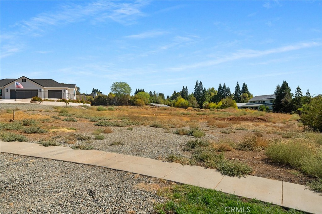6 Matada Court Chico, CA 95928 - Photo 12 of 14 a view of a yard with an ocean beach