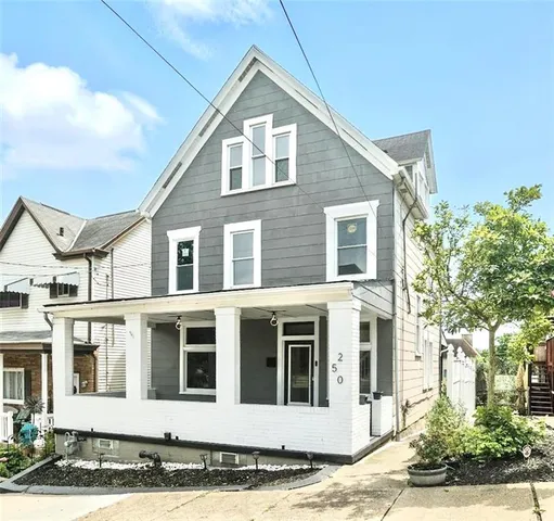 a front view of a house with a houses