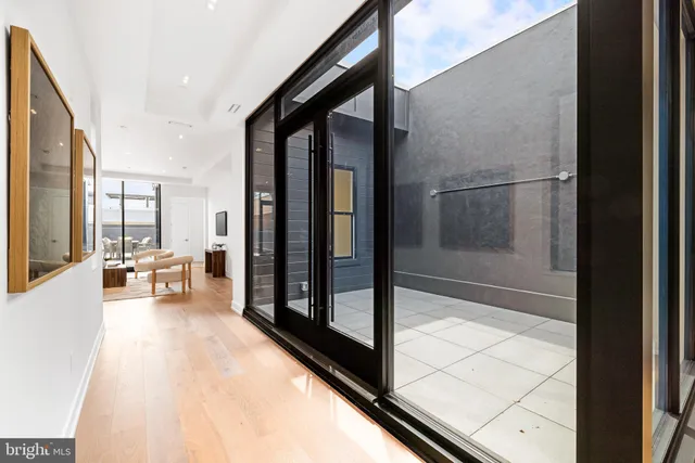 a view of terrace with seating area and barbeque oven