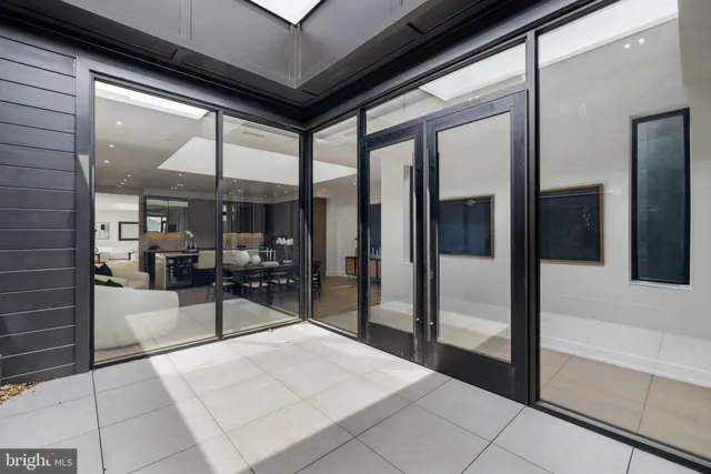 a living room with furniture or couch and a flat screen tv