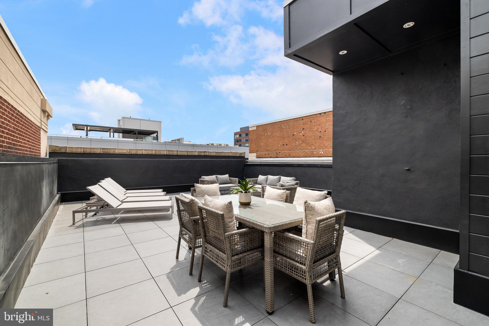 124 North 2nd Street, Unit PH Philadelphia, PA 19106 - Photo 32 of 69 a view of a terrace with dining table and chairs