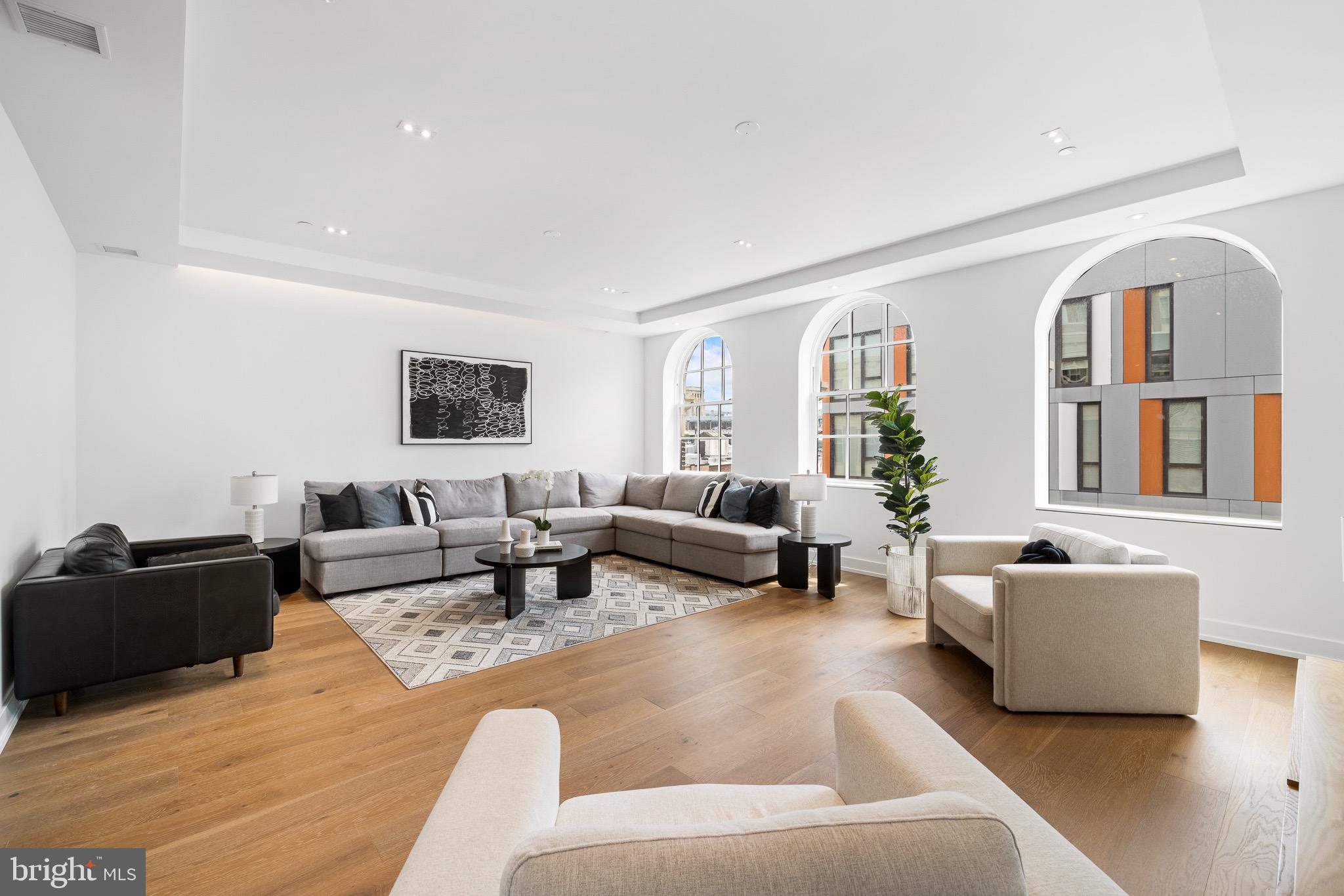 124 North 2nd Street, Unit PH Philadelphia, PA 19106 - Photo 36 of 69 a living room with furniture and a large window