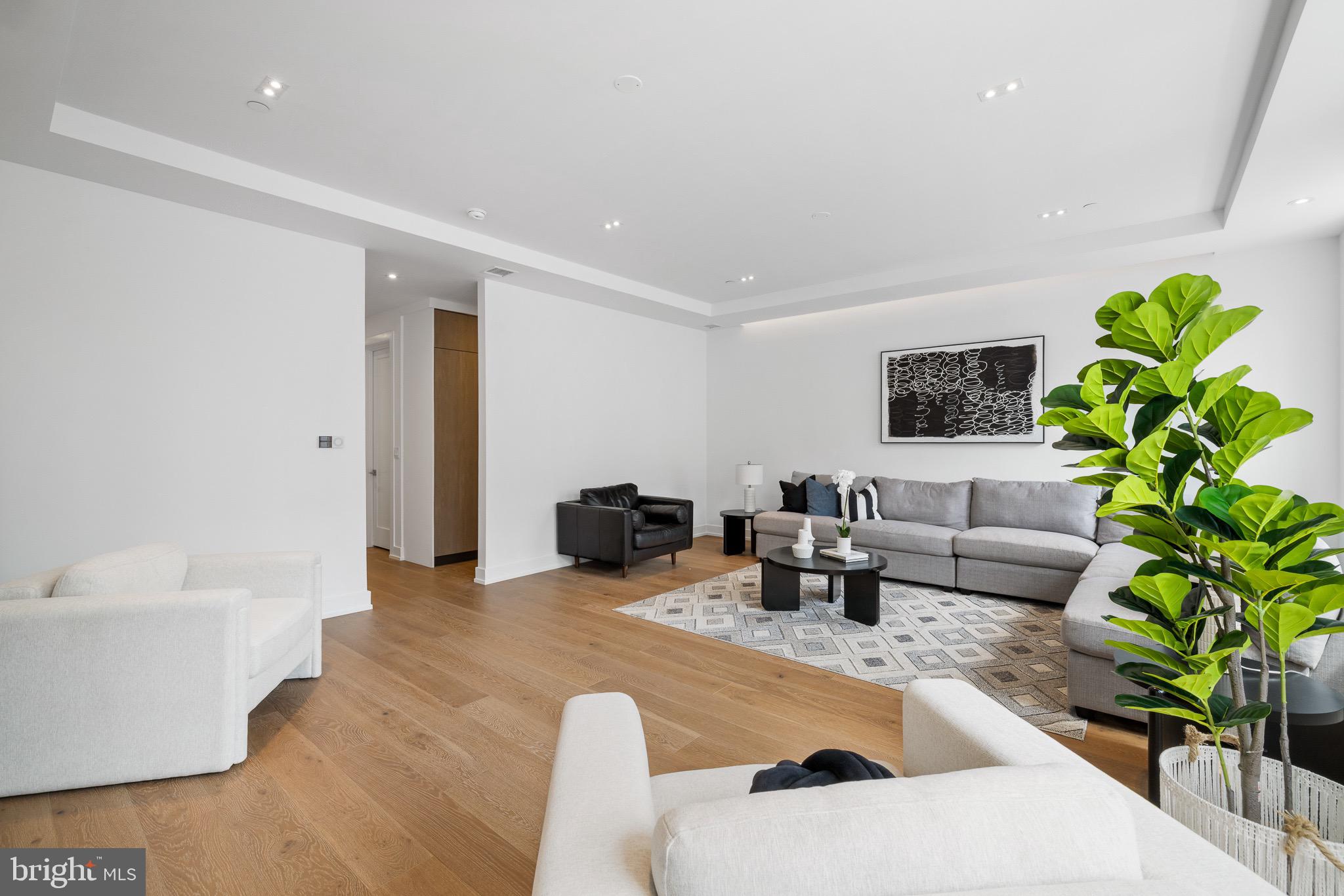 124 North 2nd Street, Unit PH Philadelphia, PA 19106 - Photo 38 of 69 a living room with furniture potted plant and a window