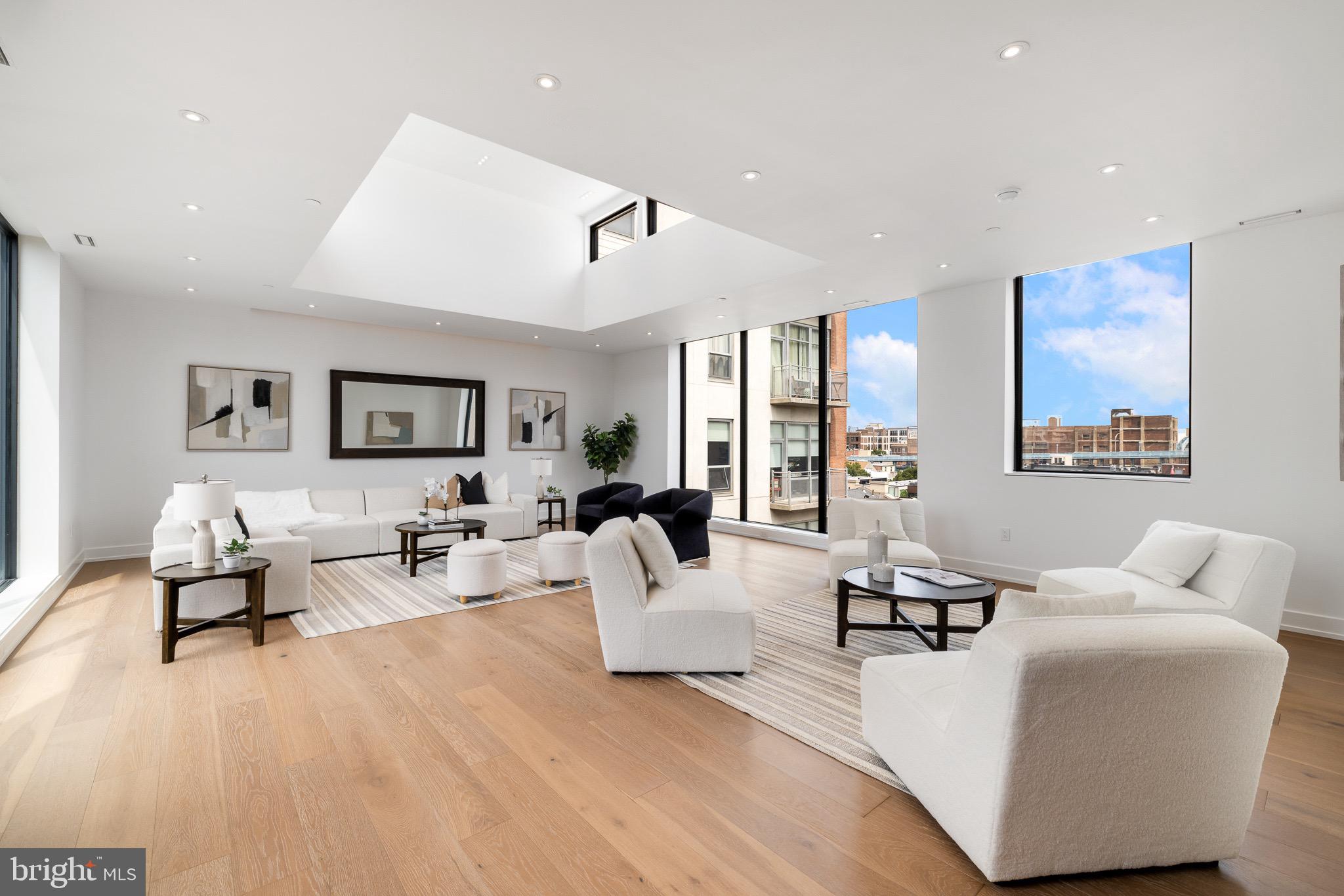 124 North 2nd Street, Unit PH Philadelphia, PA 19106 - Photo 4 of 69 a living room with furniture and white walls