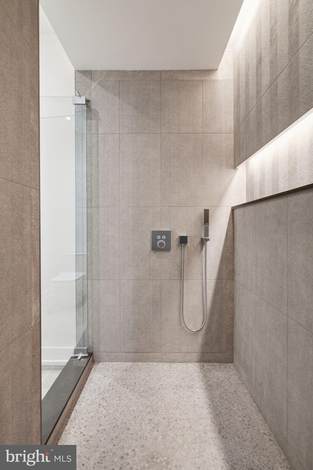 124 North 2nd Street, Unit PH Philadelphia, PA 19106 - Photo 49 of 69 a bathroom with a shower