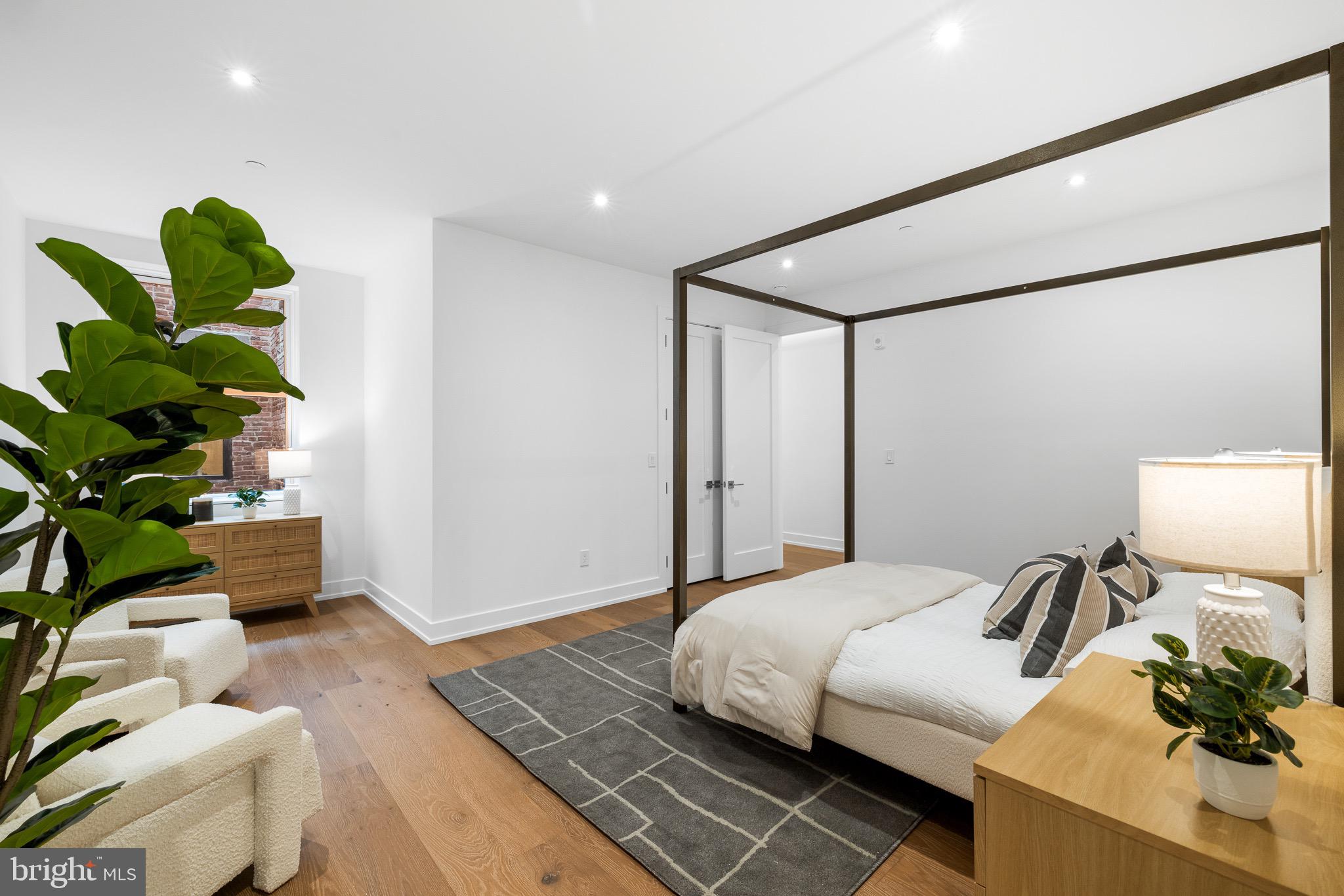 124 North 2nd Street, Unit PH Philadelphia, PA 19106 - Photo 50 of 69 a bedroom with a bed and a couch