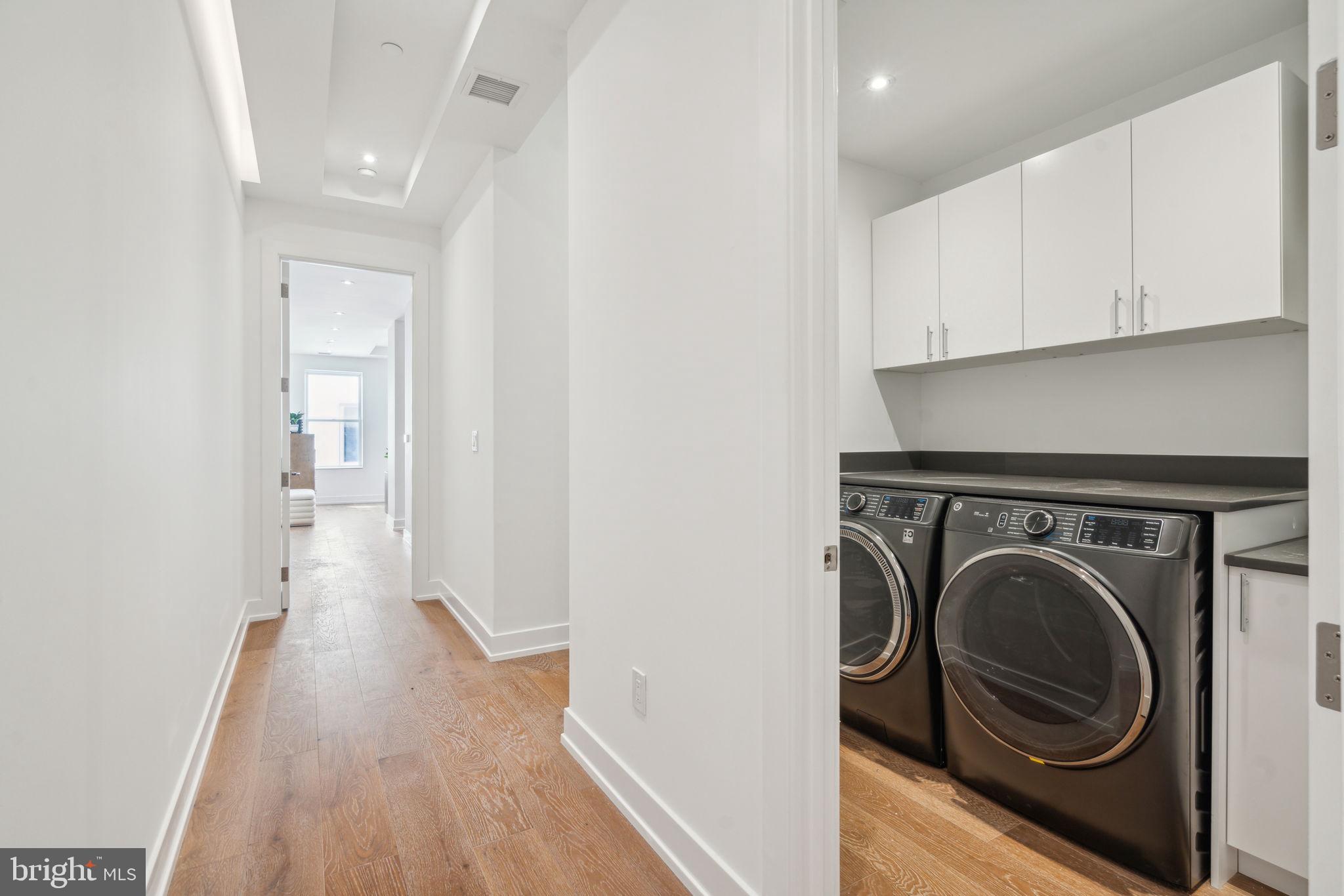 124 North 2nd Street, Unit PH Philadelphia, PA 19106 - Photo 51 of 69 a view of a hallway with washer and dryer