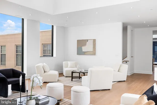 a kitchen with a sink stove top oven and cabinets