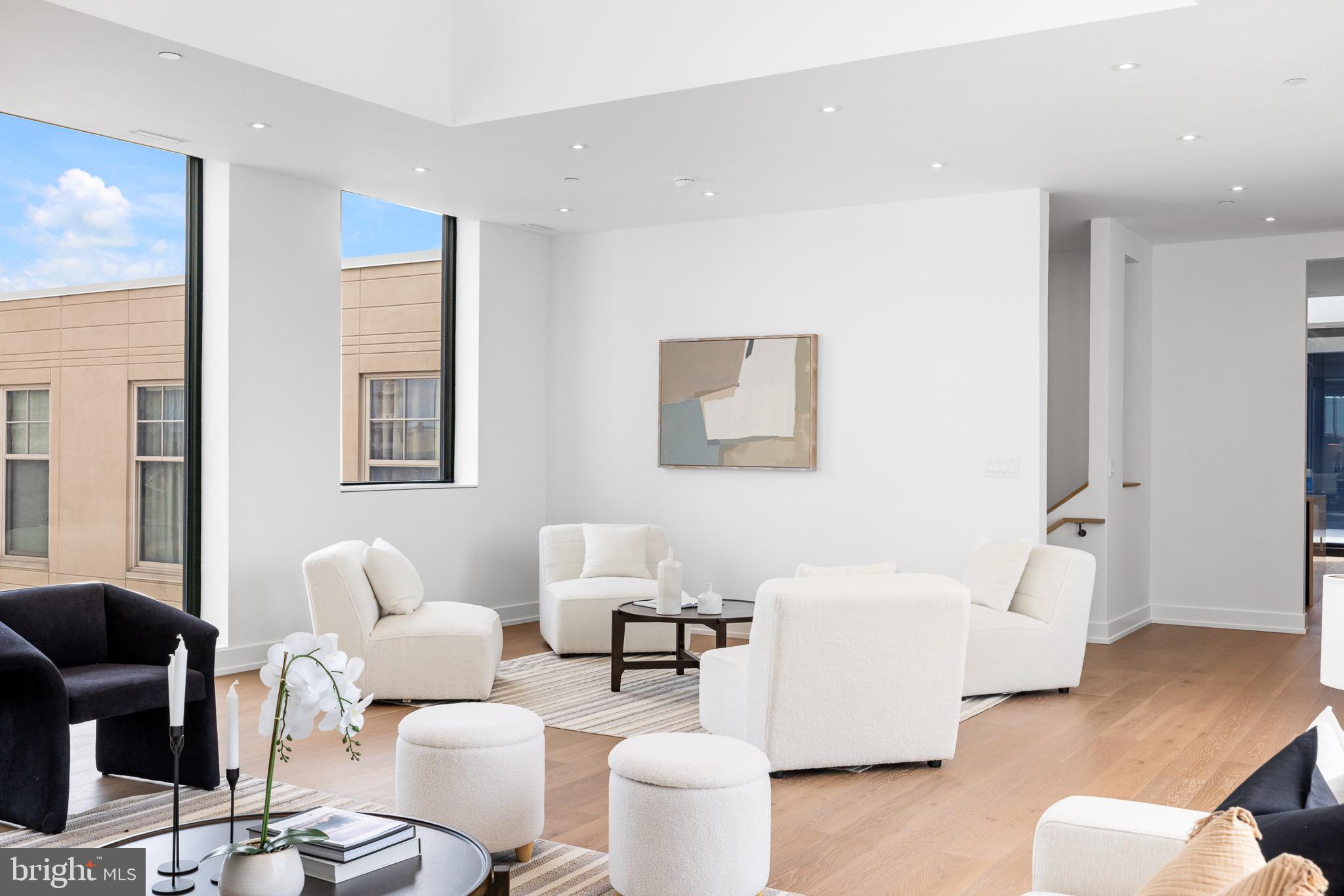 124 North 2nd Street, Unit PH Philadelphia, PA 19106 - Photo 10 of 69 a living room with furniture and a wooden floor
