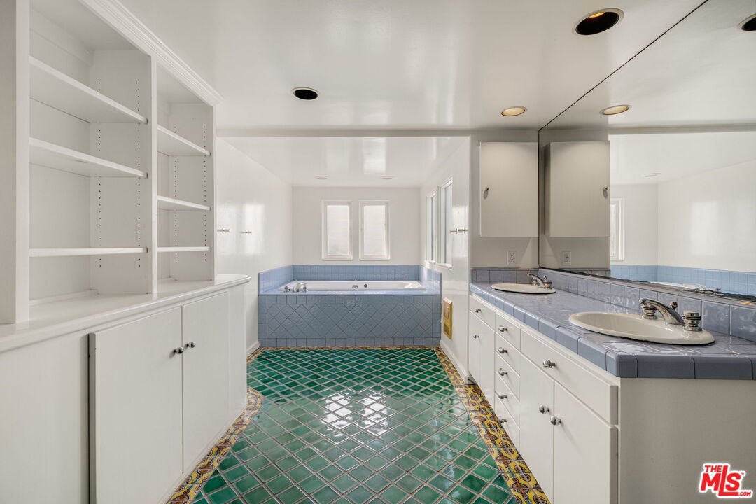 2335 Silver Ridge Avenue Los Angeles, CA 90039 - Photo 13 of 15 a bathroom with a double vanity sink mirror and double