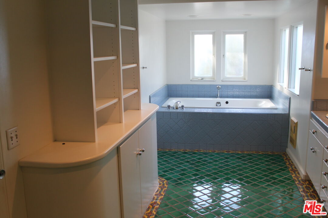 2335 Silver Ridge Avenue Los Angeles, CA 90039 - Photo 7 of 17 a bathroom with a sink and a bathtub