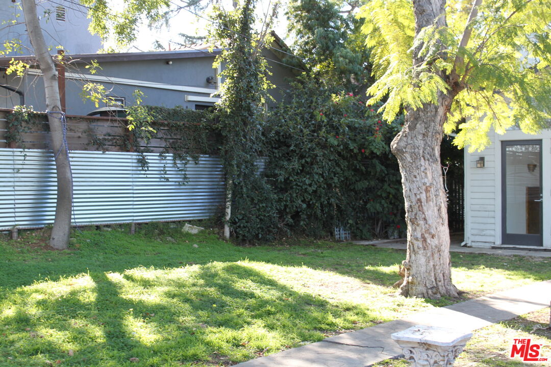 2335 Silver Ridge Avenue Los Angeles, CA 90039 - Photo 10 of 17 a view of a backyard with a tree