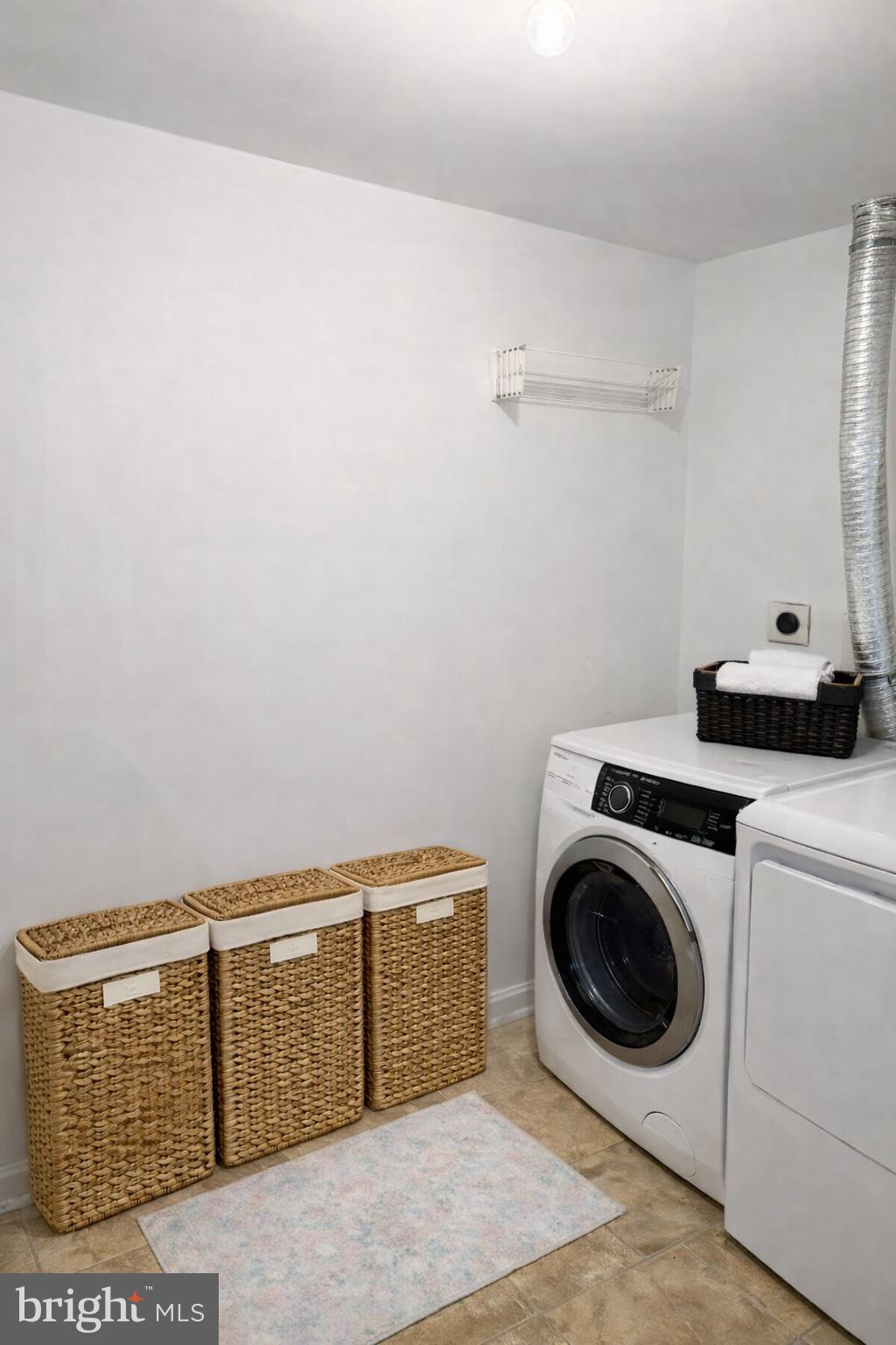3720 39th Street Northwest, Unit D166 Washington, DC 20016 - Photo 8 of 58 In-unit laundry room AI virtually staged