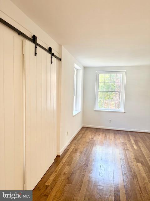 3720 39th Street Northwest, Unit D166 Washington, DC 20016 - Photo 9 of 58 Living room with sliding door to den