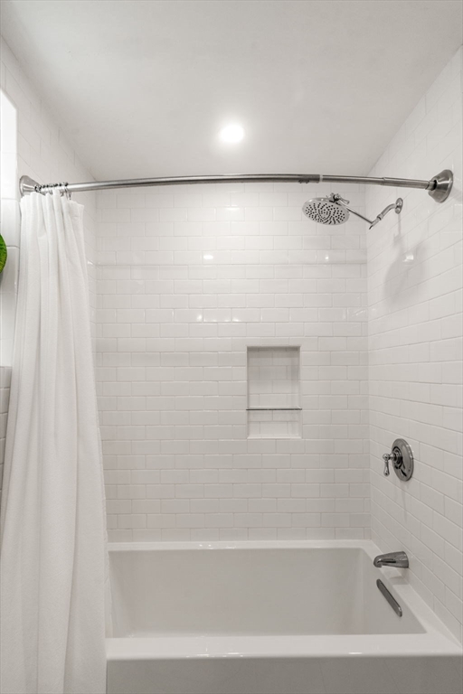 3 Kenney Street, Unit 2 Boston, MA 02130 - Photo 9 of 24 a bathroom with a shower and a bath tub