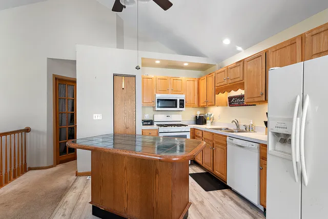 a bed room with a bed and a window