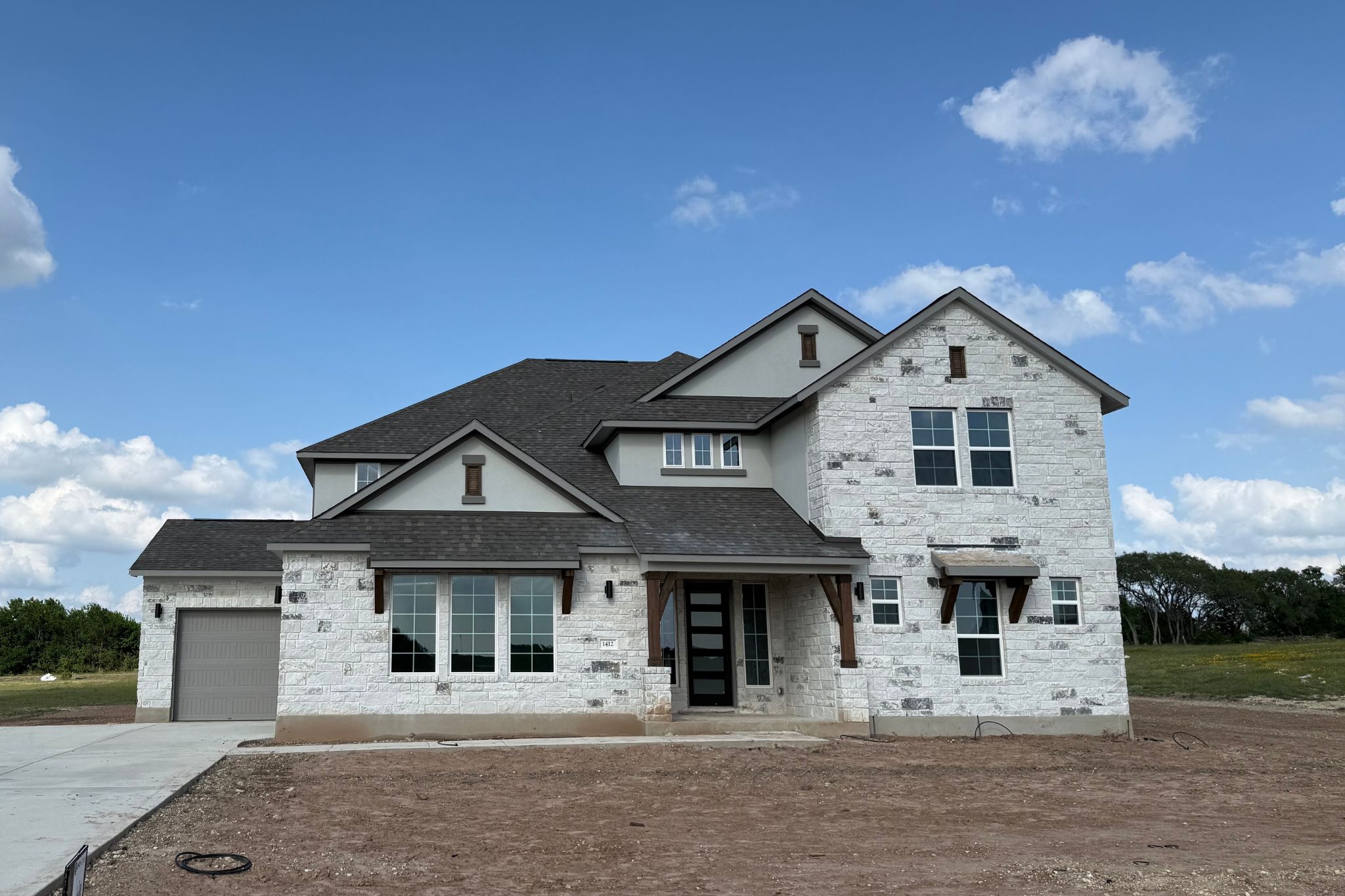 1412 Paxton Lane Georgetown, TX 78633 - Photo 1 of 14 a front view of a house with white walls