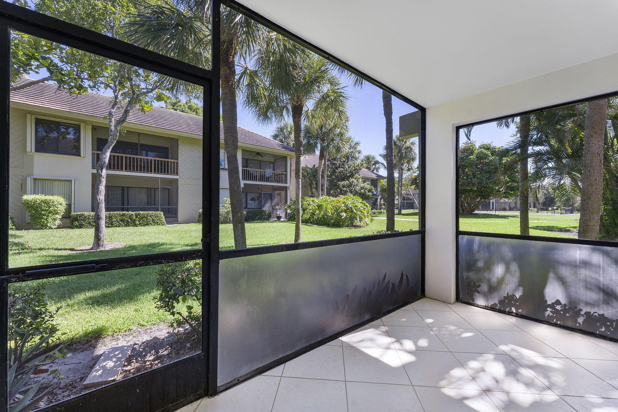159 Northwest 70th Street, Unit 603 Boca Raton, FL 33487 - Photo 25 of 35 a view of a porch in front of a building