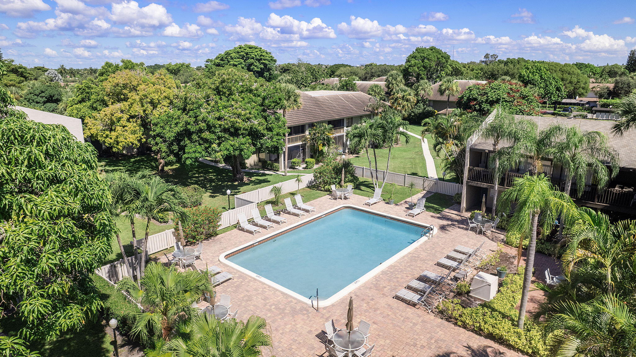 159 Northwest 70th Street, Unit 603 Boca Raton, FL 33487 - Photo 28 of 35 a view of a yard with plants