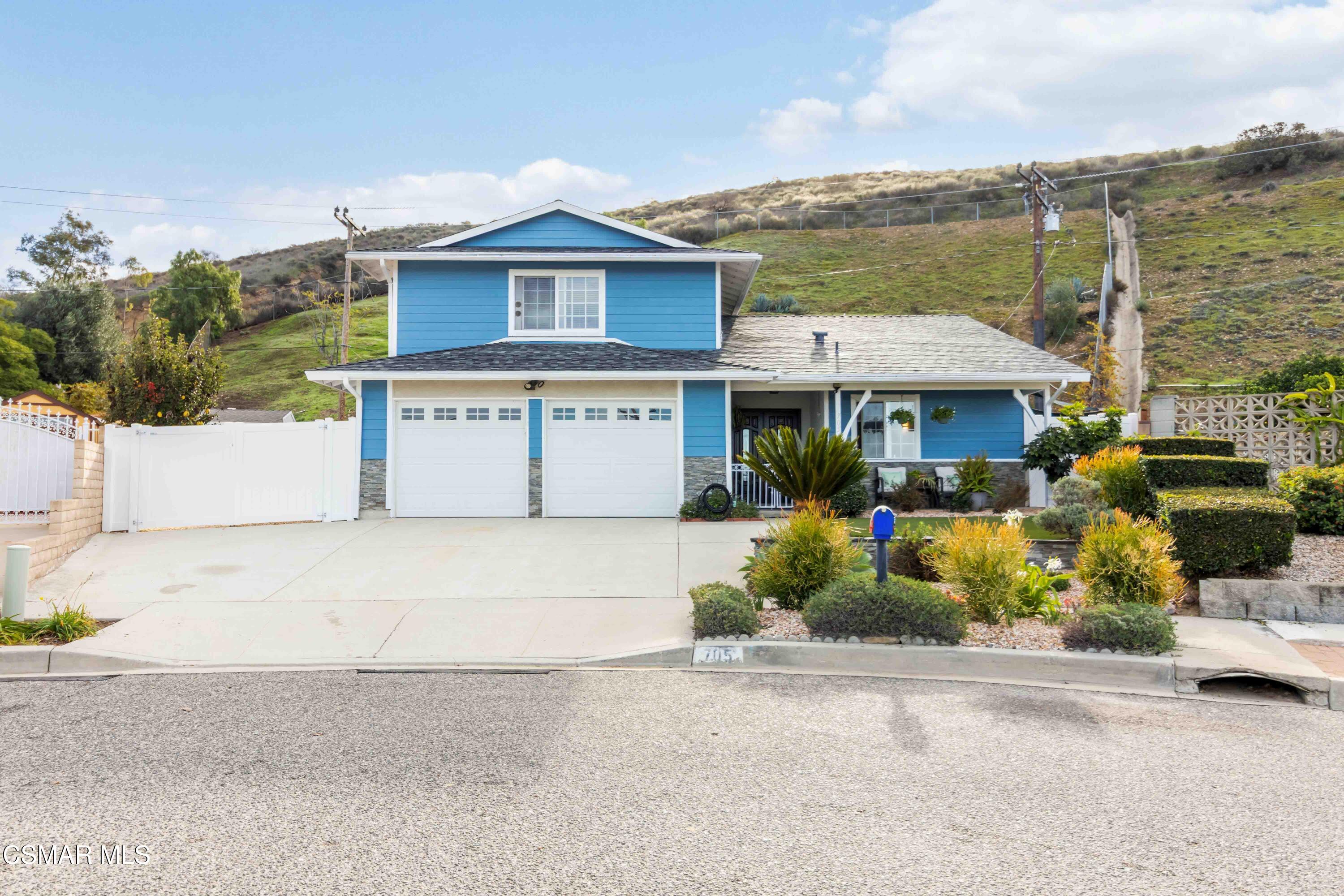 705 Wishard Avenue Simi Valley, CA 93065 - Photo 1 of 50 front view of a house with a garden