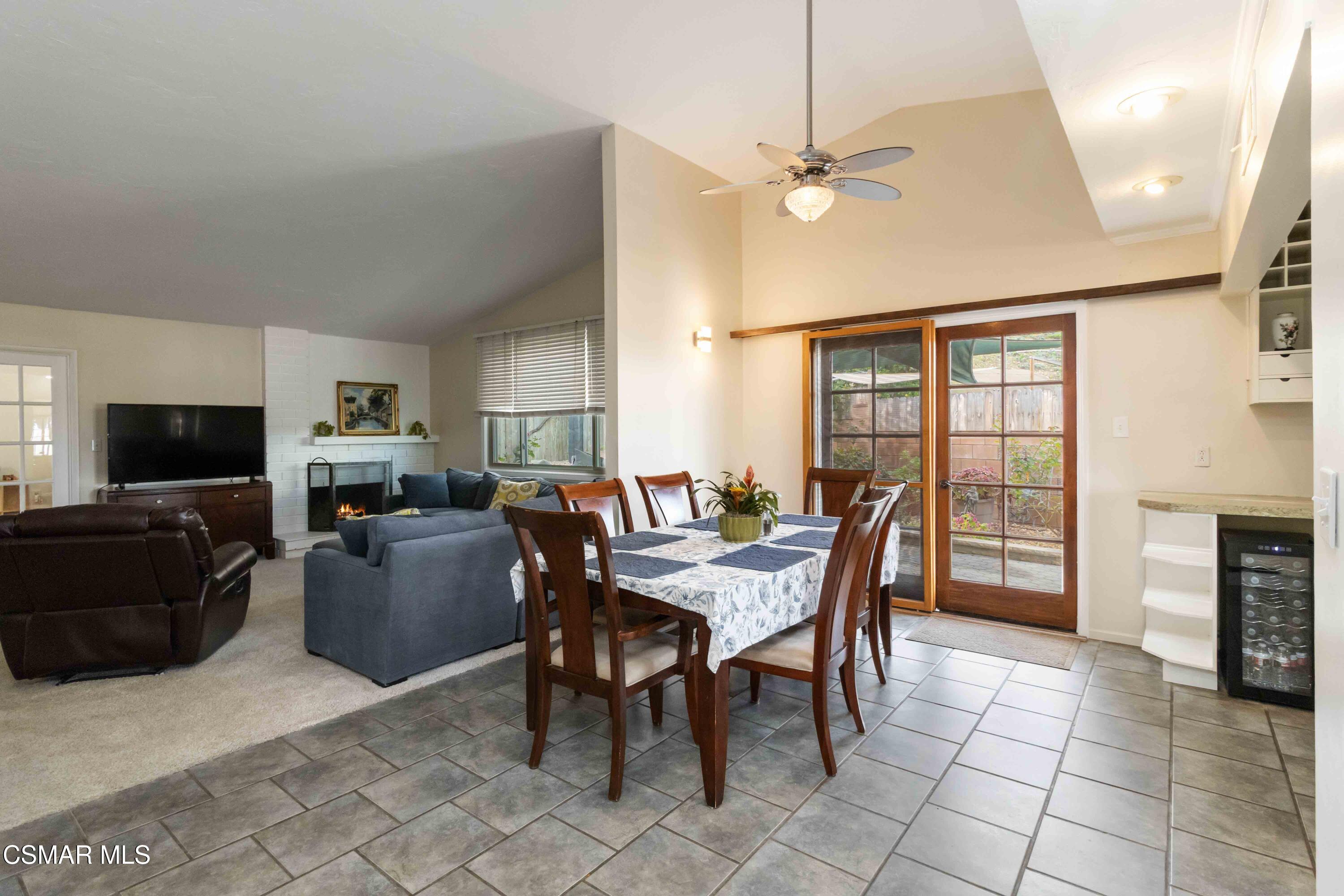 705 Wishard Avenue Simi Valley, CA 93065 - Photo 12 of 50 a living room with furniture a flat screen tv and a fireplace